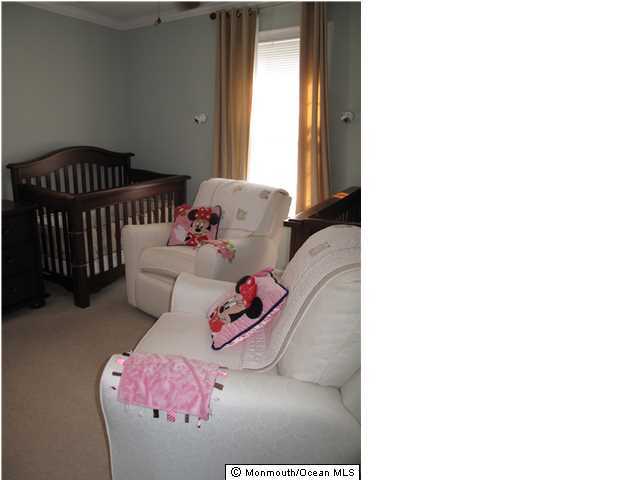 45 Sweet Gum Road Howell, NJ 07731 - Photo 20 of 25 a living room with furniture and a window