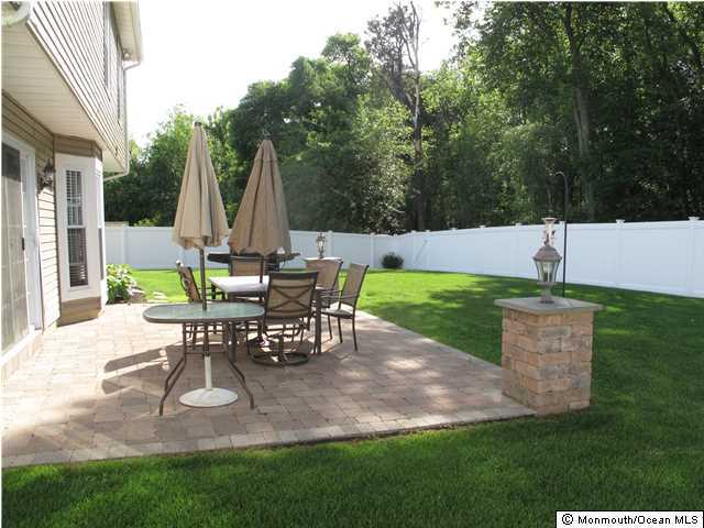 45 Sweet Gum Road Howell, NJ 07731 - Photo 23 of 25 a view of a house with backyard and sitting area