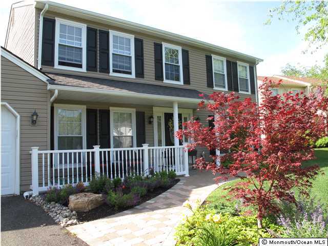 45 Sweet Gum Road Howell, NJ 07731 - Photo 25 of 25 a front view of a house with a yard