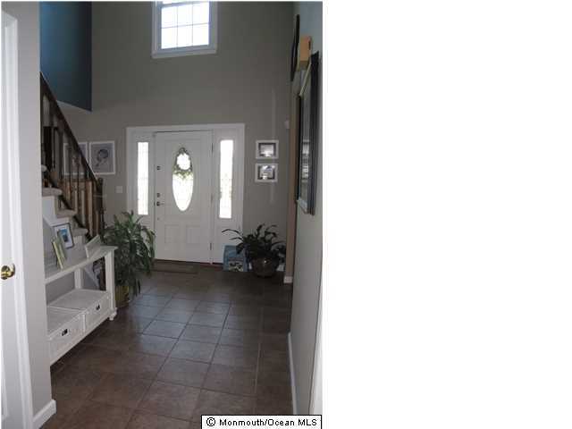 45 Sweet Gum Road Howell, NJ 07731 - Photo 6 of 25 a view of livingroom with furniture and closet