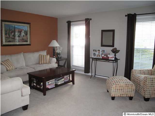 45 Sweet Gum Road Howell, NJ 07731 - Photo 7 of 25 a living room with furniture and a window