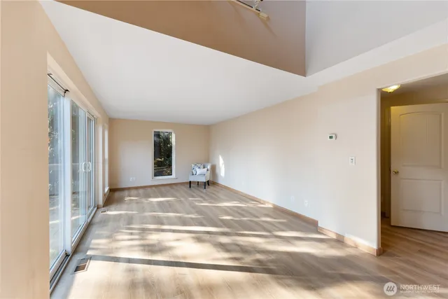 a view of a room with a large window