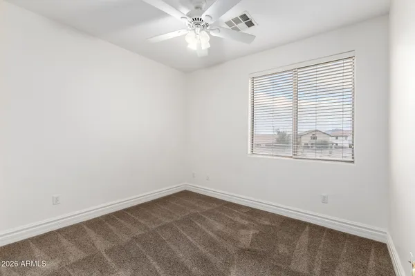 an aerial view of a house with a garden