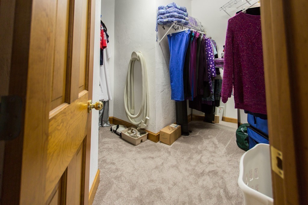 261 Dunham Road Warren, MA 01010 - Photo 15 of 25 a view of a closet with storage