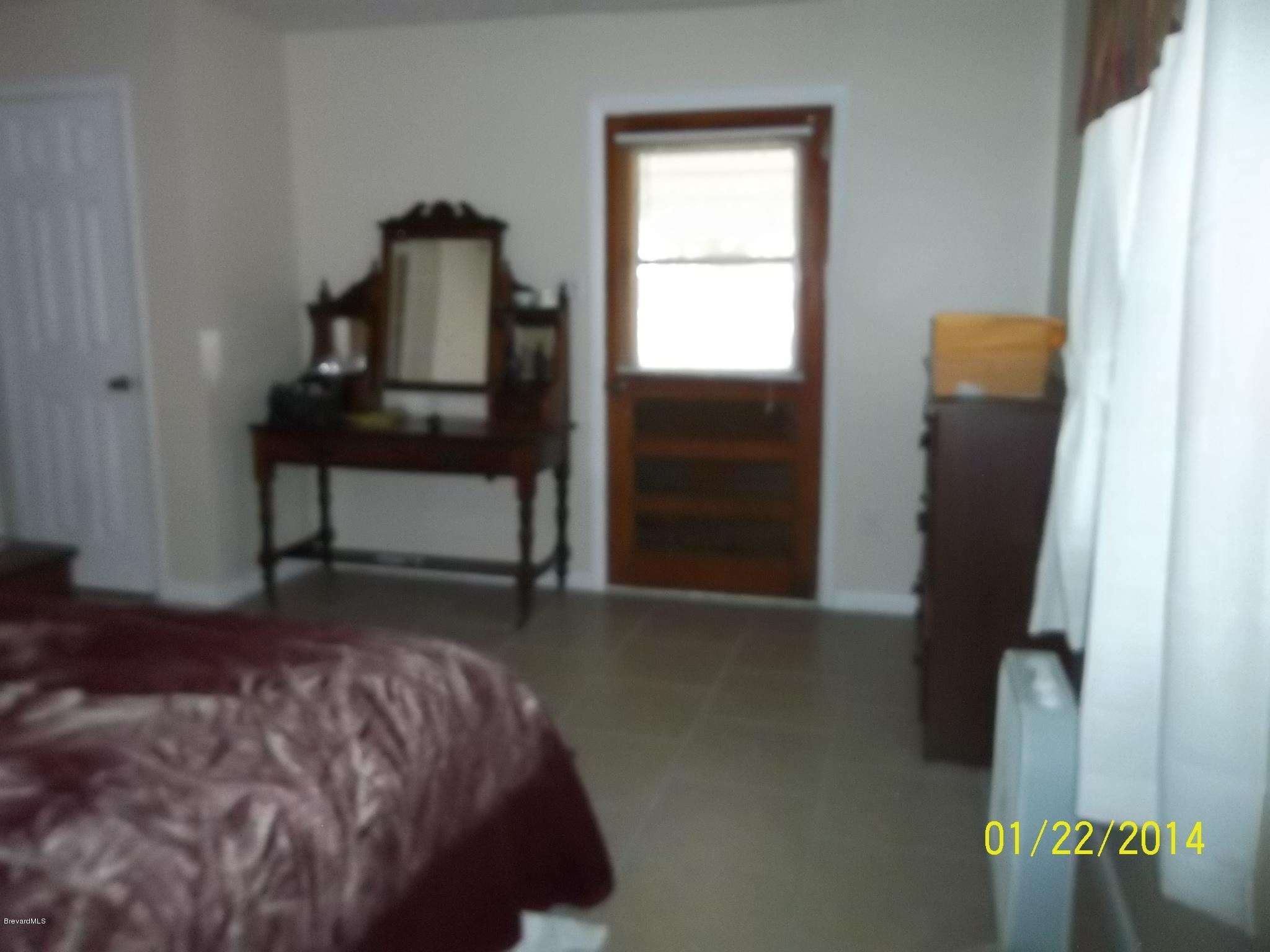 4041 Mullens Road Mims, FL 32754 - Photo 17 of 27 master bedroom