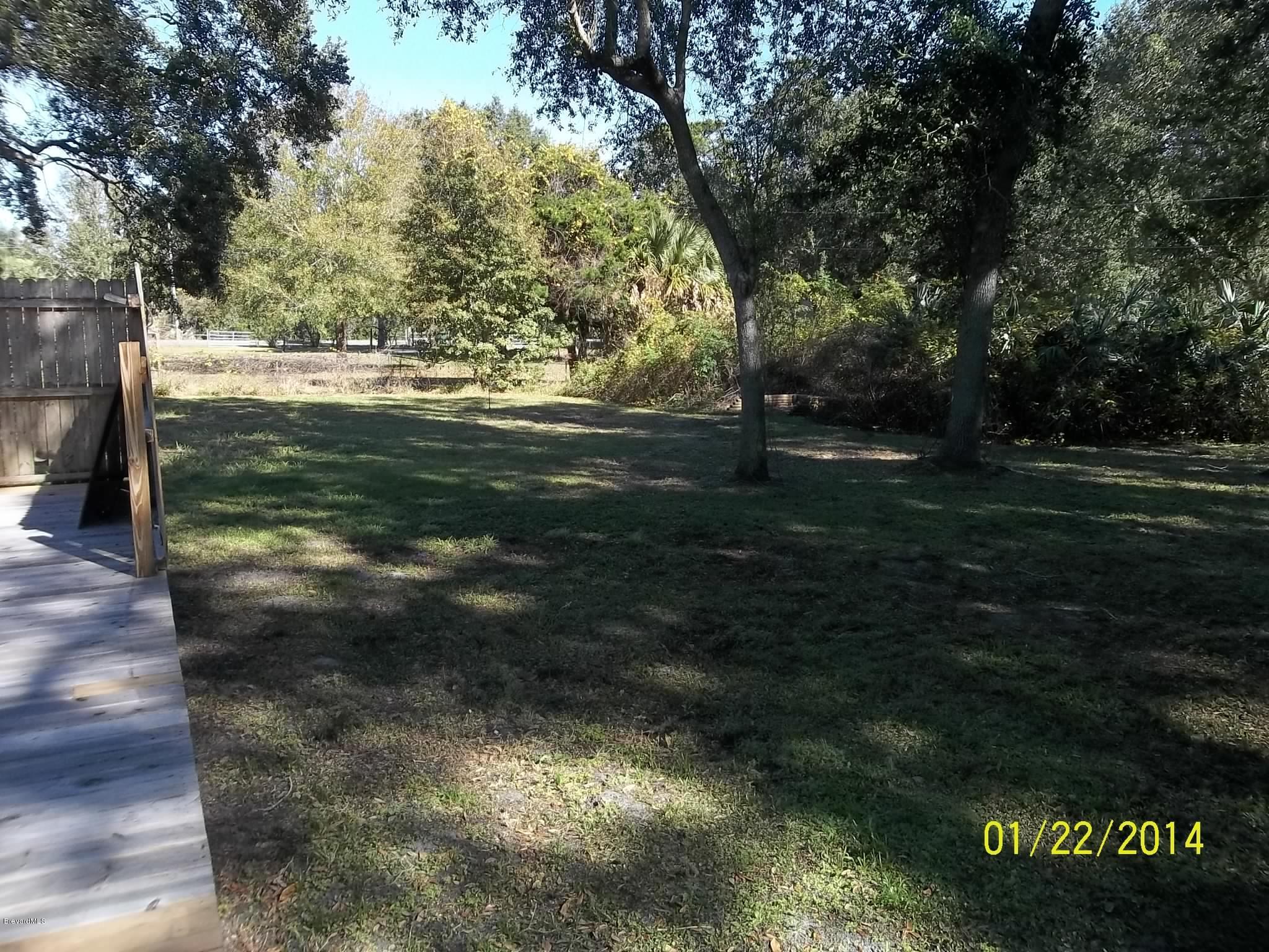 4041 Mullens Road Mims, FL 32754 - Photo 20 of 27 backyard