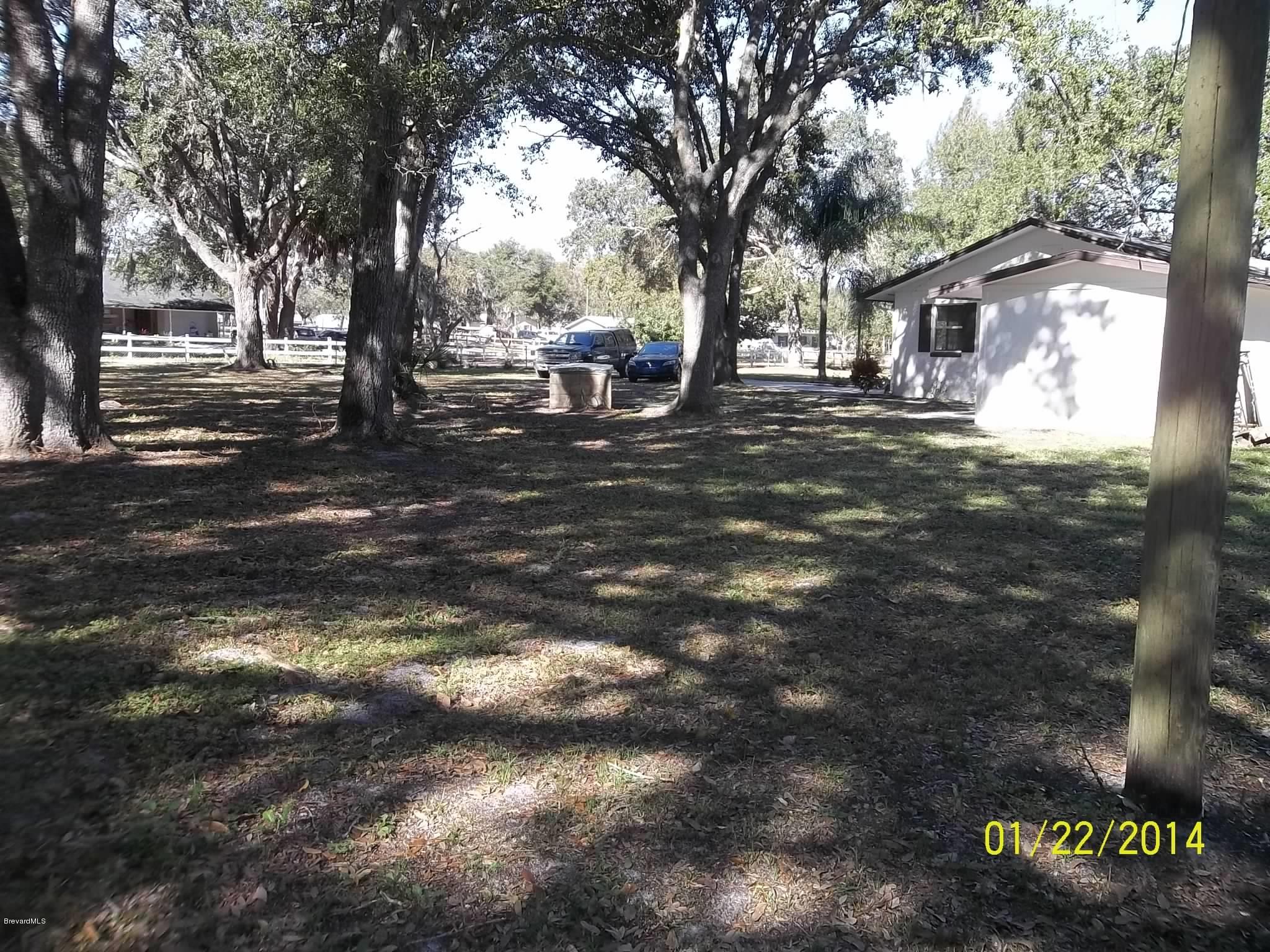4041 Mullens Road Mims, FL 32754 - Photo 23 of 27 right side of house