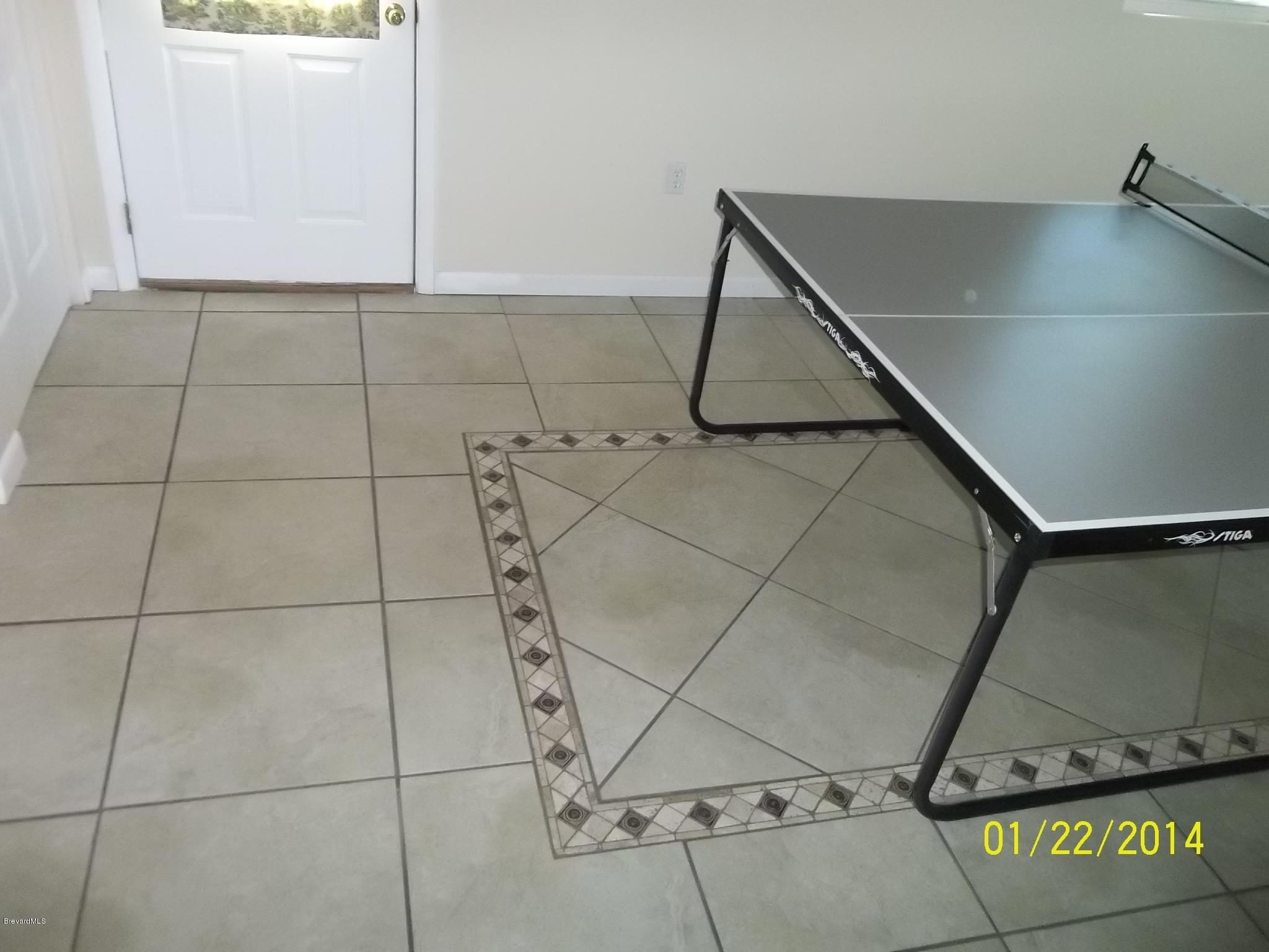 4041 Mullens Road Mims, FL 32754 - Photo 6 of 27 tiled floor in family room