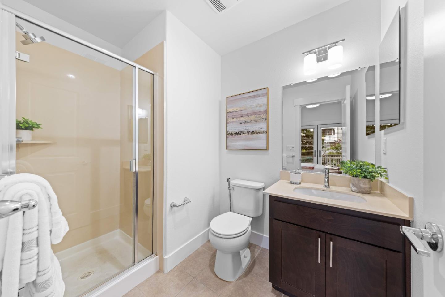 856 Sycamore Loop Mountain View, CA 94043 - Photo 13 of 27 a bathroom with a sink a toilet and shower