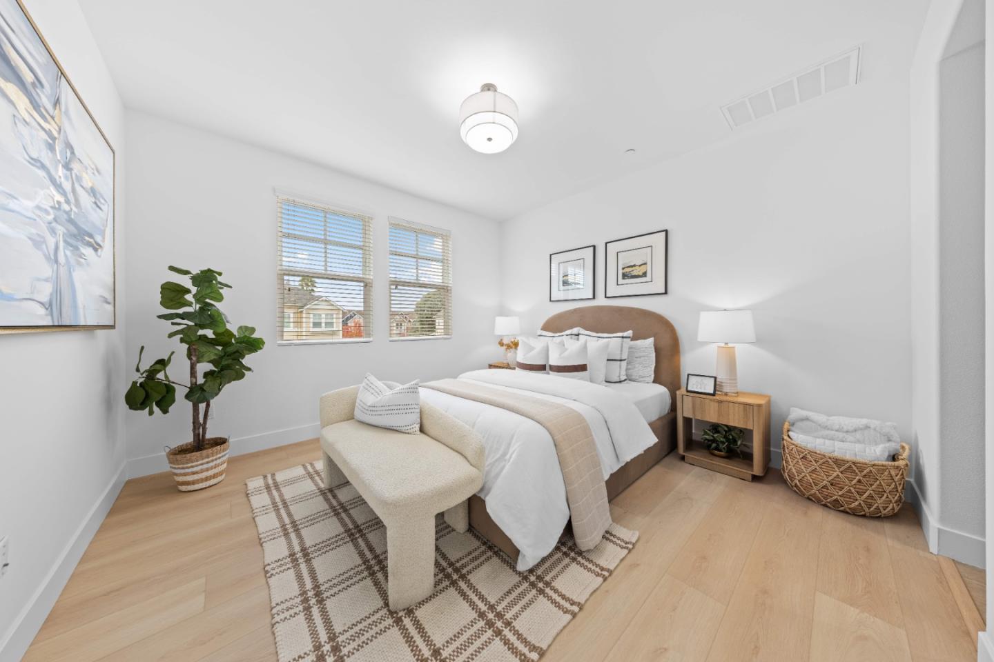 856 Sycamore Loop Mountain View, CA 94043 - Photo 14 of 27 a bedroom with a bed and a potted plant