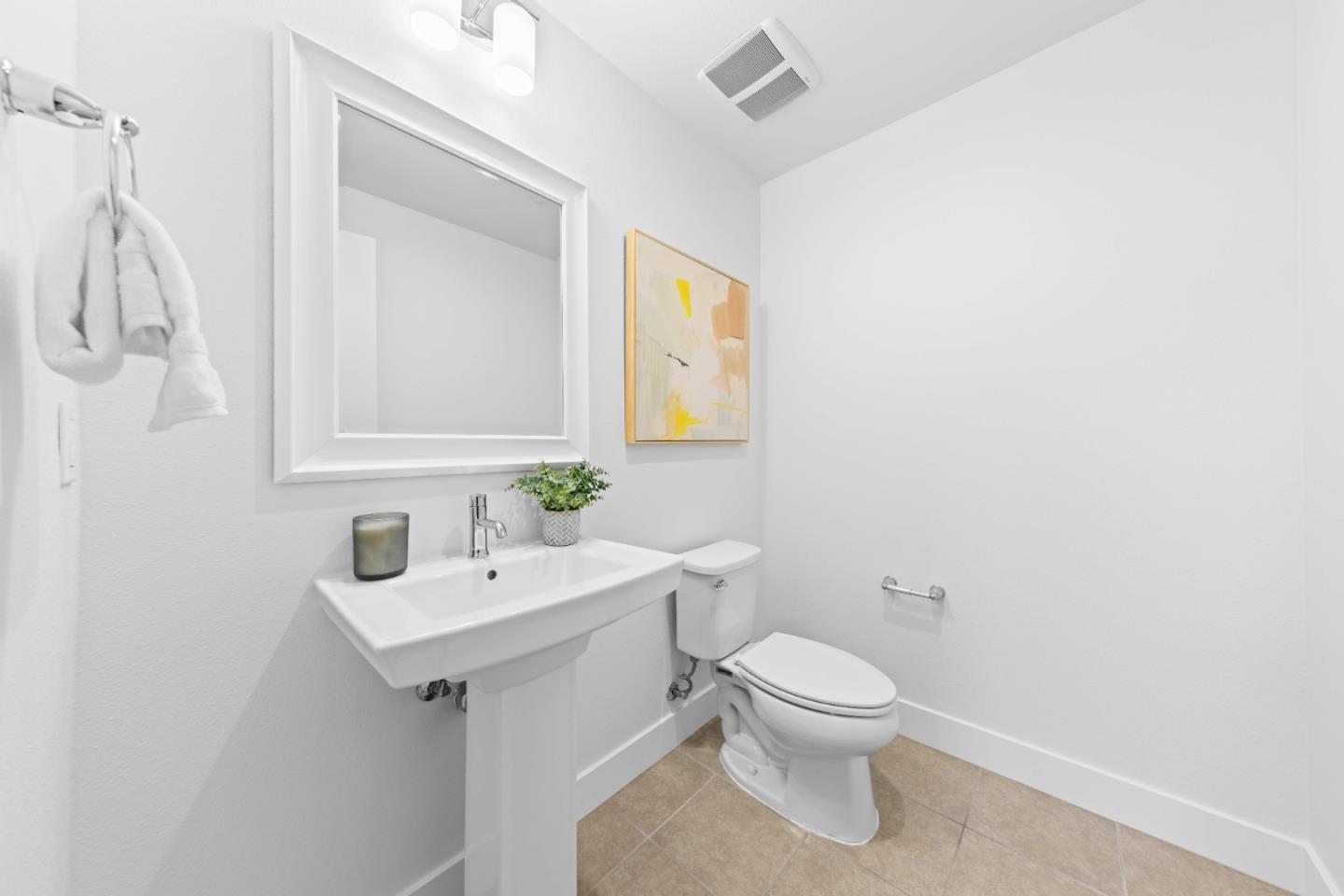 856 Sycamore Loop Mountain View, CA 94043 - Photo 21 of 27 a bathroom with a toilet sink and mirror