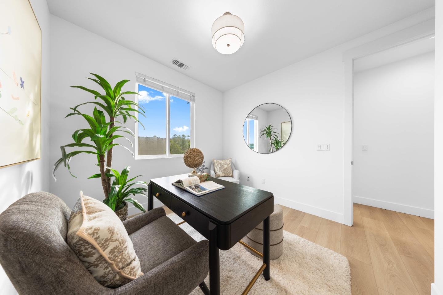 856 Sycamore Loop Mountain View, CA 94043 - Photo 23 of 27 a living room with furniture and a potted plant