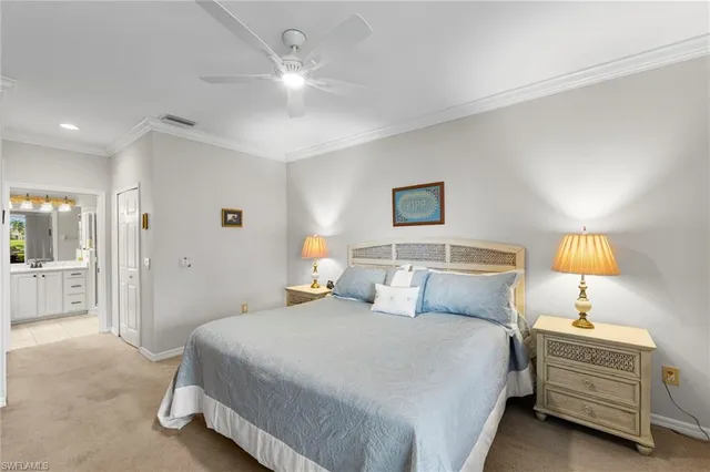 a bedroom with bed and a night stand