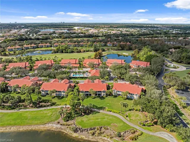 an aerial view of residential houses and city