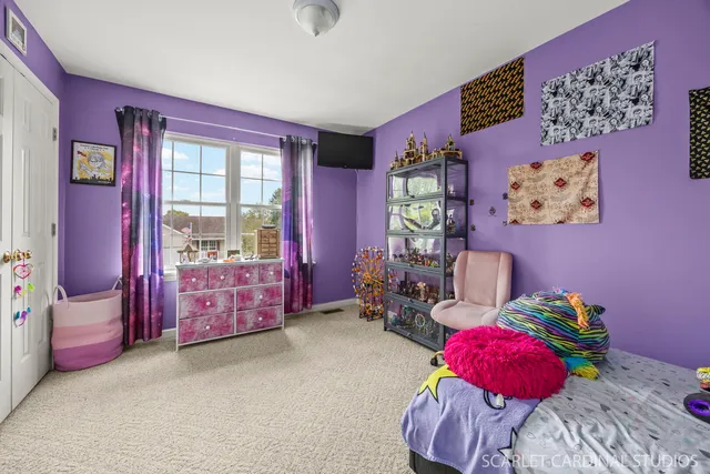 a bedroom with furniture and a bed