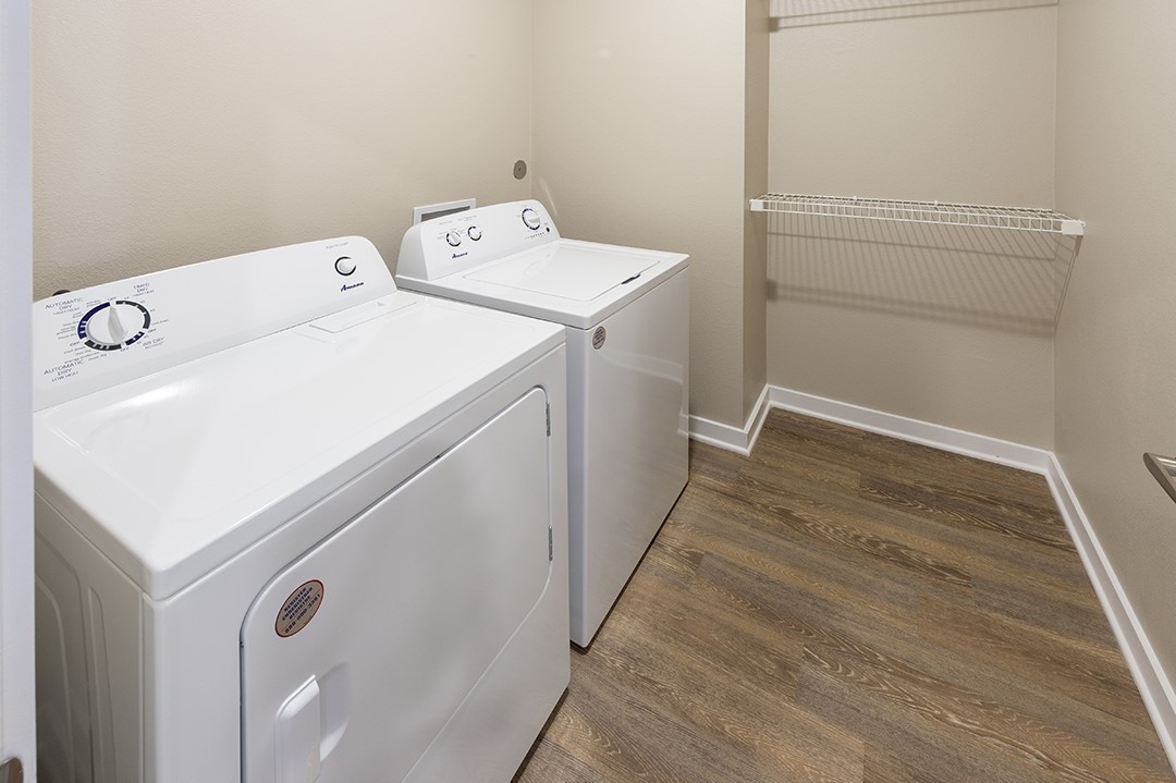 1724 Partnership Way, Unit 3101 Katy, TX 77449 - Photo 23 of 30 Utility room with full size washer and dryer