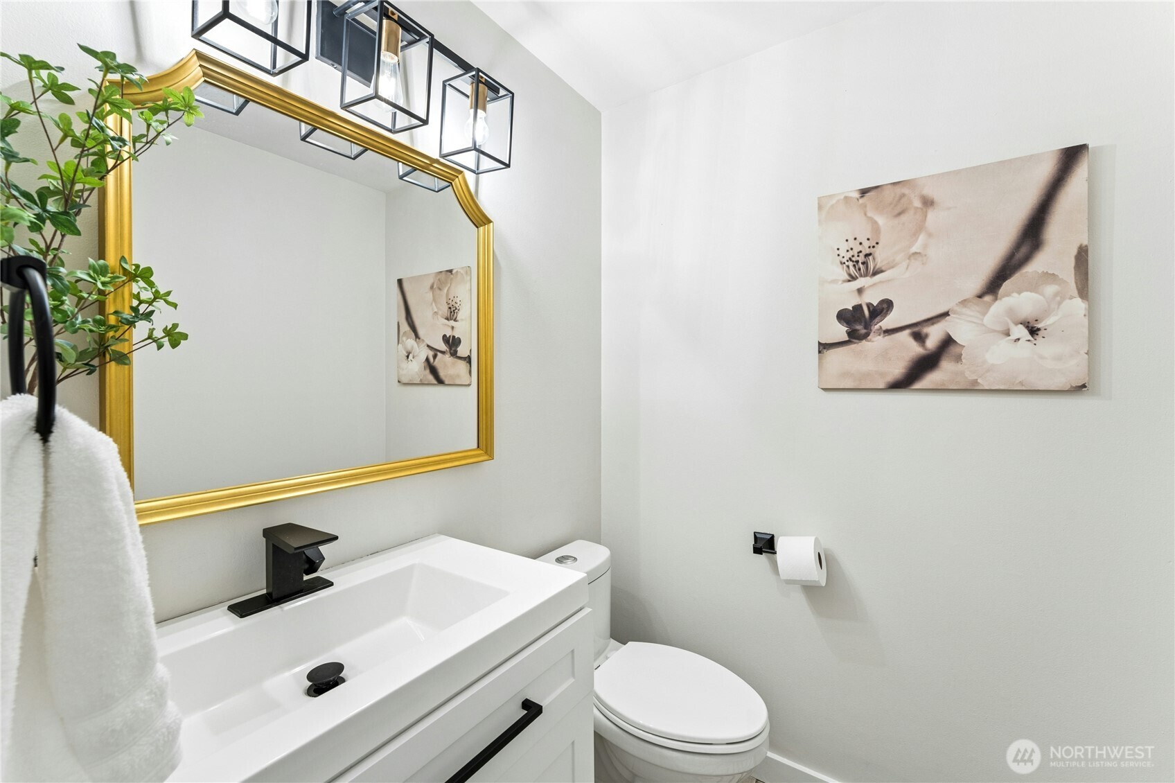 18152 145th Avenue Southeast Renton, WA 98058 - Photo 15 of 40 a bathroom with a sink mirror and toilet