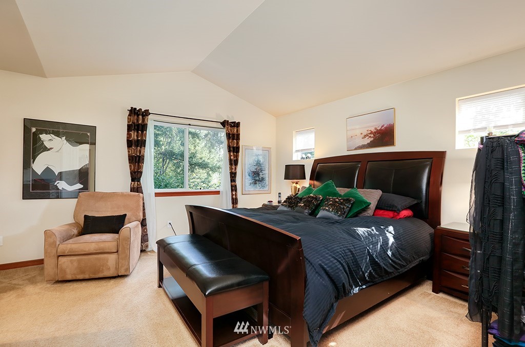 17801 20th Avenue Southeast Bothell, WA 98012 - Photo 11 of 25 a bedroom with a bed and a couch