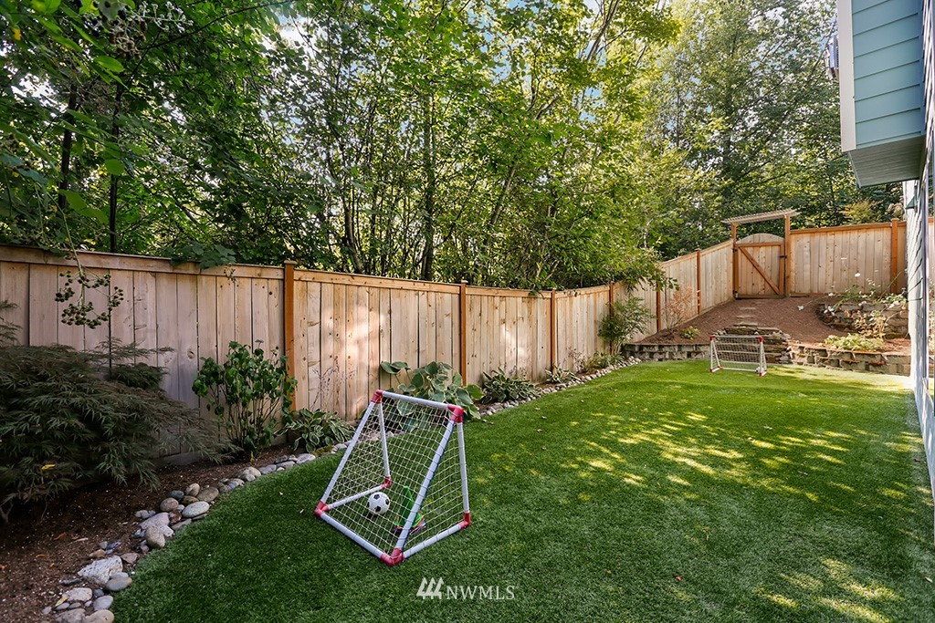 17801 20th Avenue Southeast Bothell, WA 98012 - Photo 24 of 25 a view of a backyard with a slide