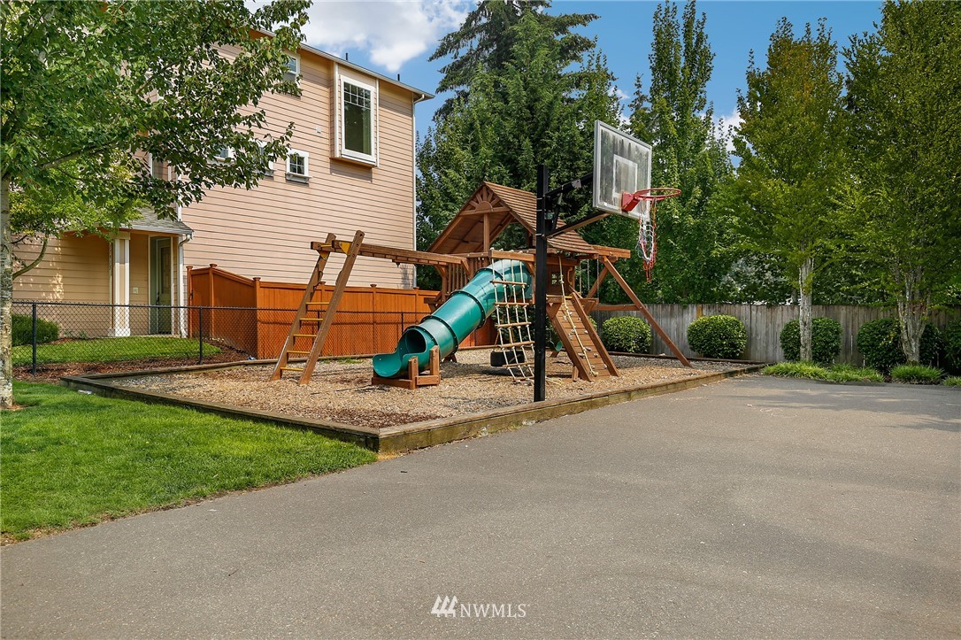 17801 20th Avenue Southeast Bothell, WA 98012 - Photo 25 of 25 a view of a park with plants and a bench