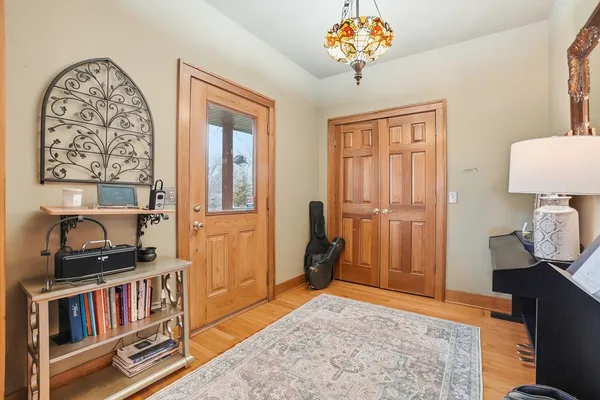 a view of a livingroom with furniture and a window