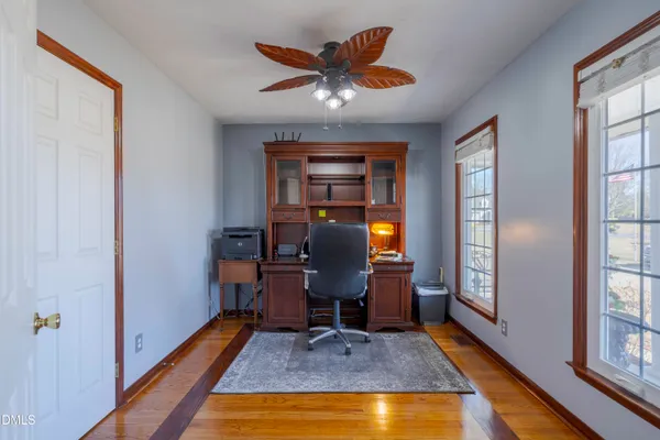 an aerial view of a house with outdoor space