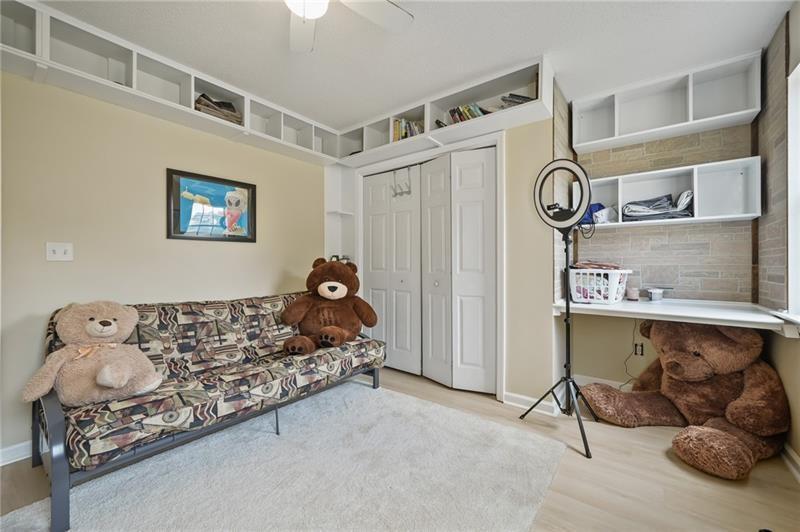5303 Meadows Lake Crossing Southwest Powder Springs, GA 30127 - Photo 21 of 53 a bed room with a bed and a window