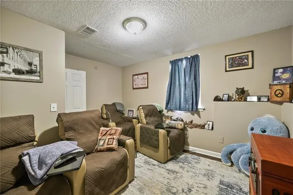 a living room with furniture and a couch