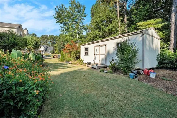 a view of a swimming pool with a patio