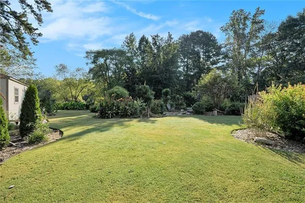 a view of a backyard with a garden