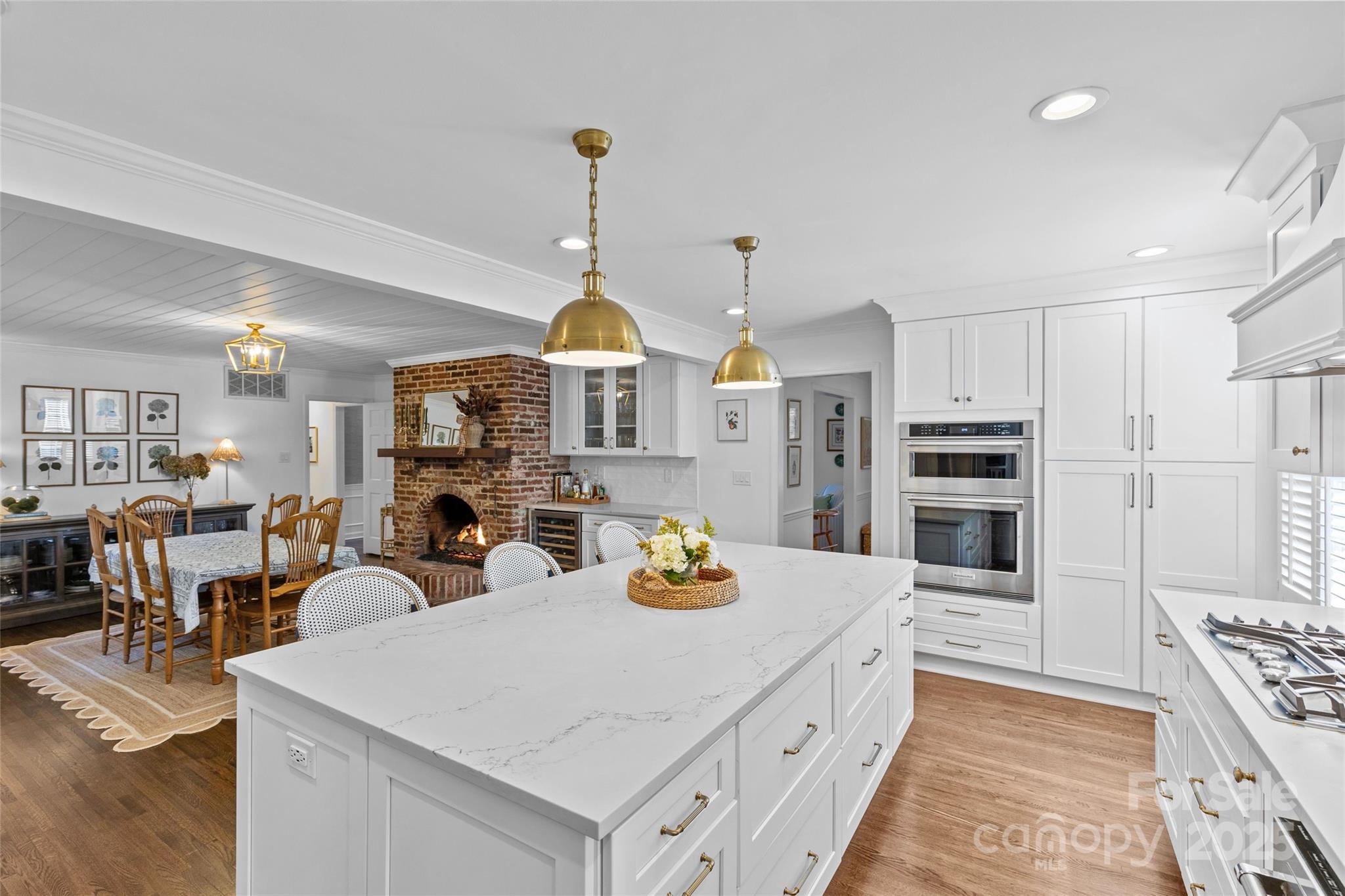 7526 Whistlestop Road Charlotte, NC 28210 - Photo 13 of 42 a kitchen with stainless steel appliances kitchen island granite countertop a sink and a refrigerator