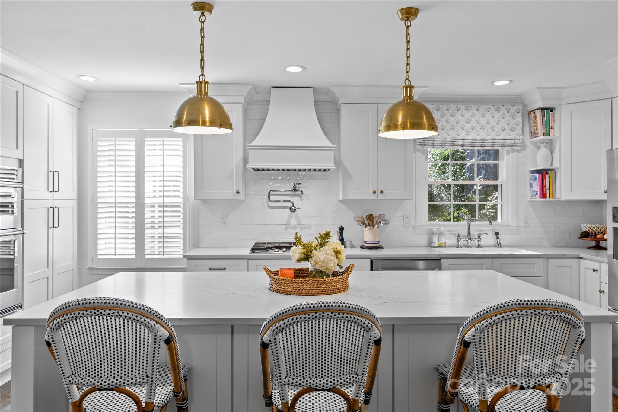 7526 Whistlestop Road Charlotte, NC 28210 - Photo 15 of 42 a kitchen with a refrigerator a sink a stove and a window