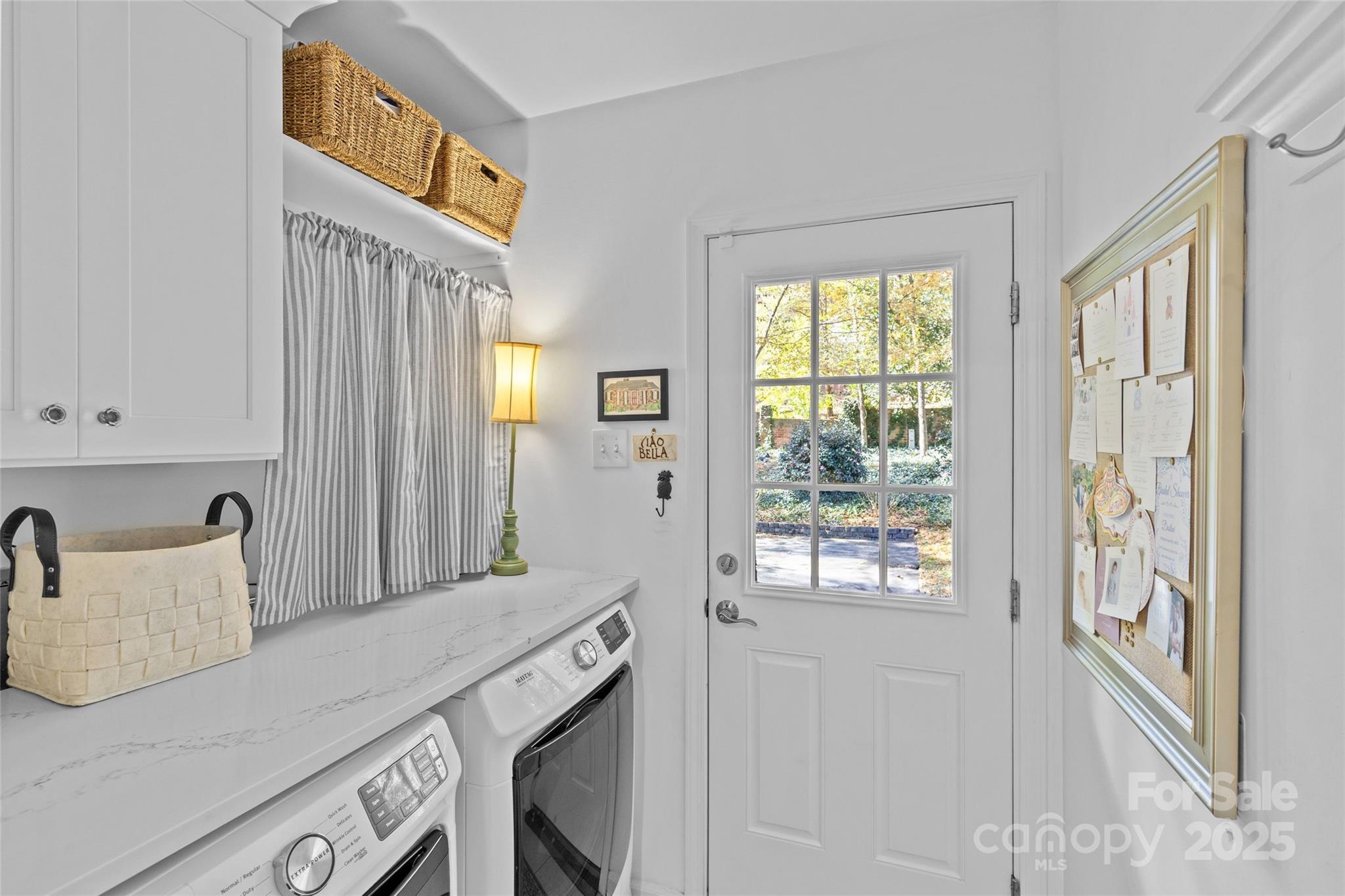 7526 Whistlestop Road Charlotte, NC 28210 - Photo 23 of 42 a view of a kitchen area with furniture and windows