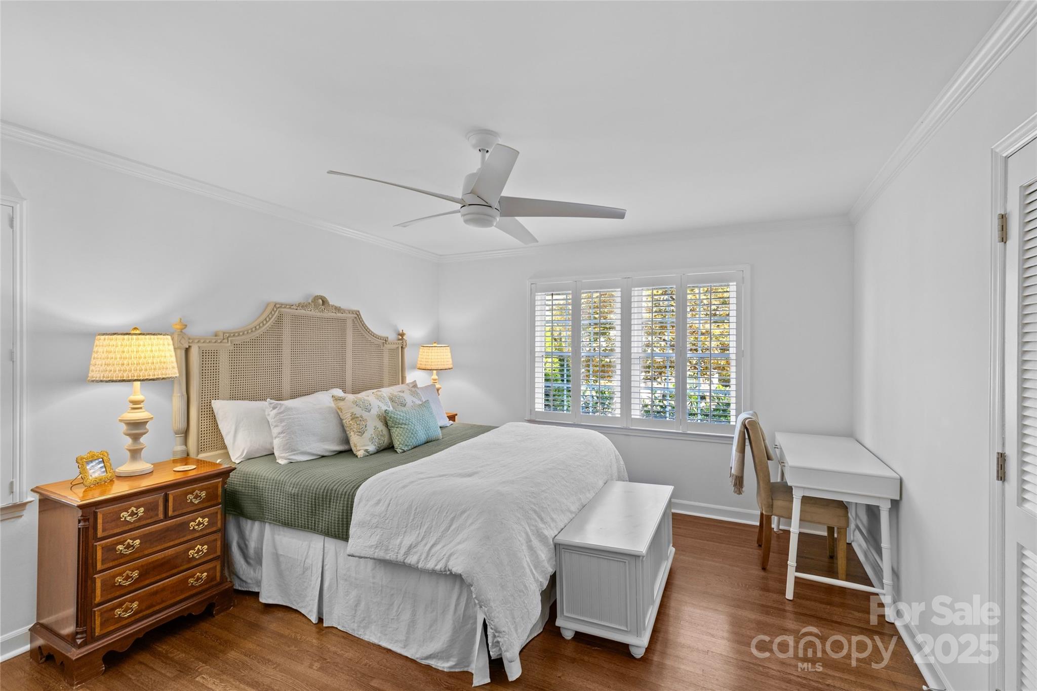 7526 Whistlestop Road Charlotte, NC 28210 - Photo 29 of 42 a bedroom with a bed and a dresser in it