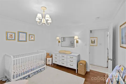 a bedroom with a bed and furniture