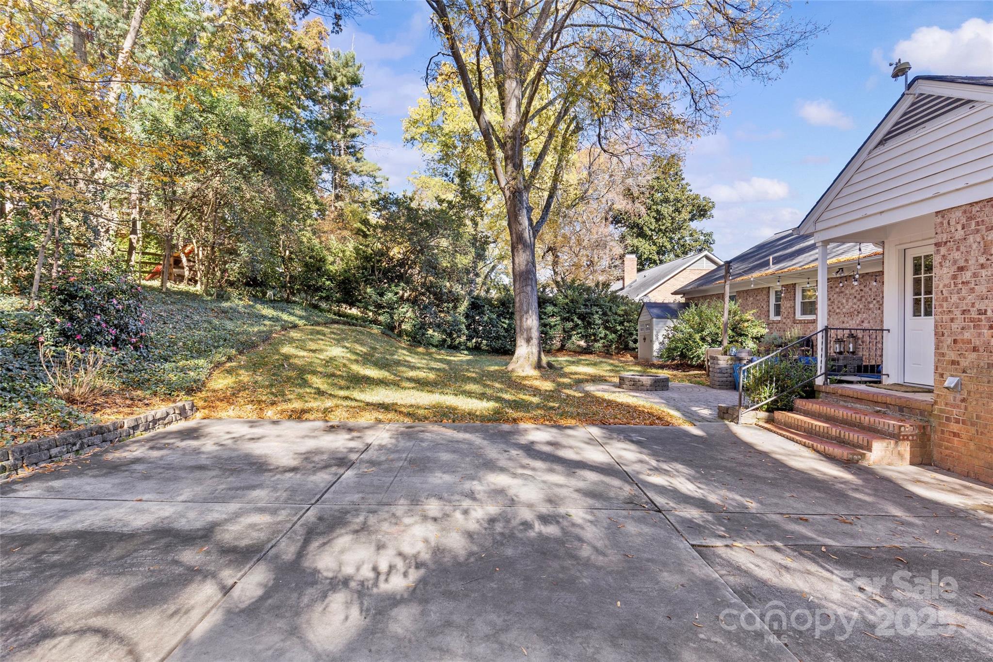 7526 Whistlestop Road Charlotte, NC 28210 - Photo 38 of 42 a view of road with large trees