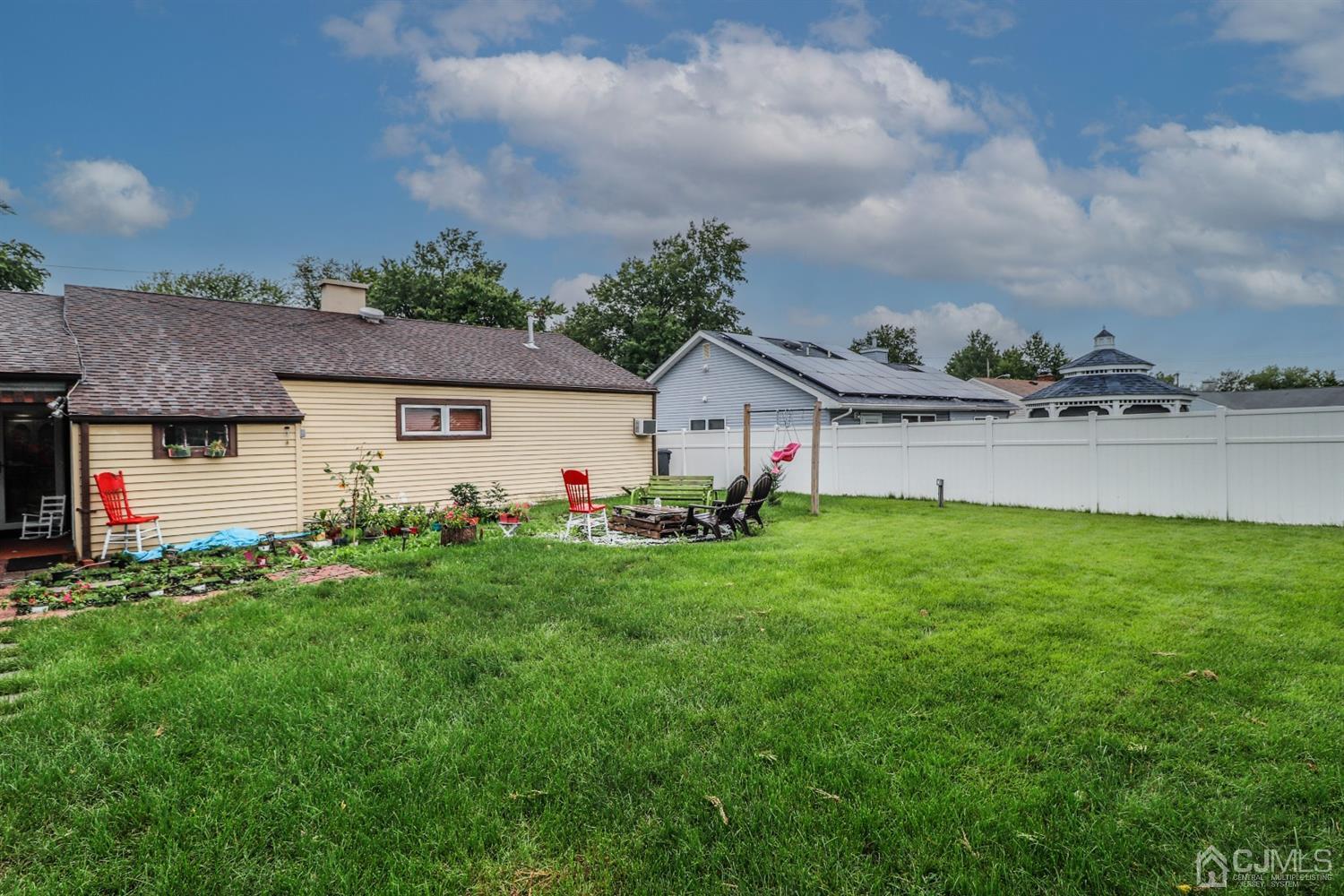 23 Matson Road Edison, NJ 08817 - Photo 23 of 28 a front view of house with yard and green space
