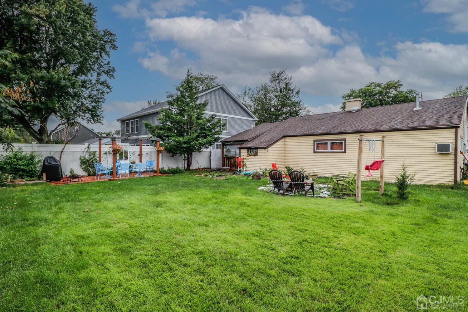 23 Matson Road Edison, NJ 08817 - Photo 24 of 28 a view of a house with a backyard