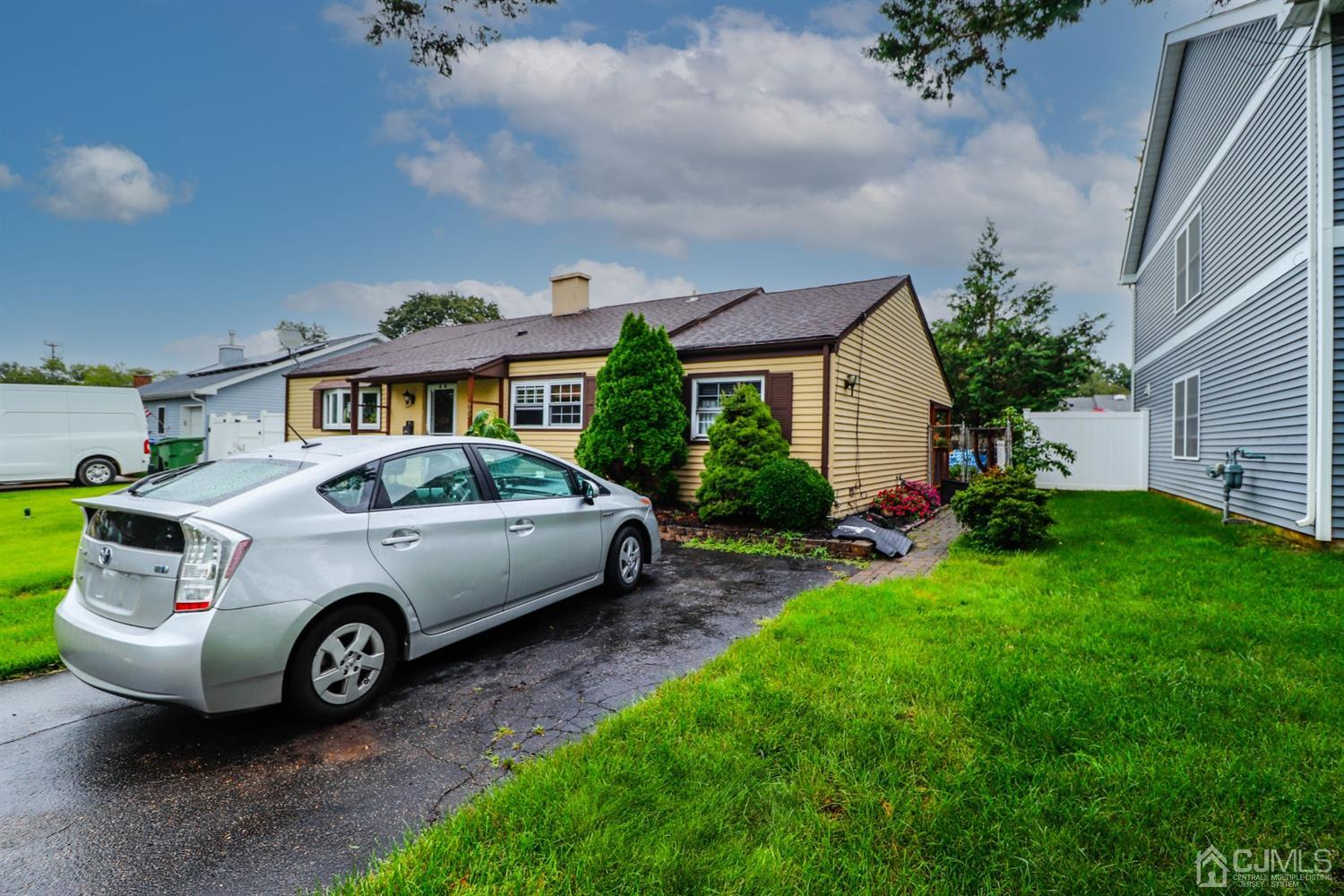 23 Matson Road Edison, NJ 08817 - Photo 4 of 28 a car parked in front of a house