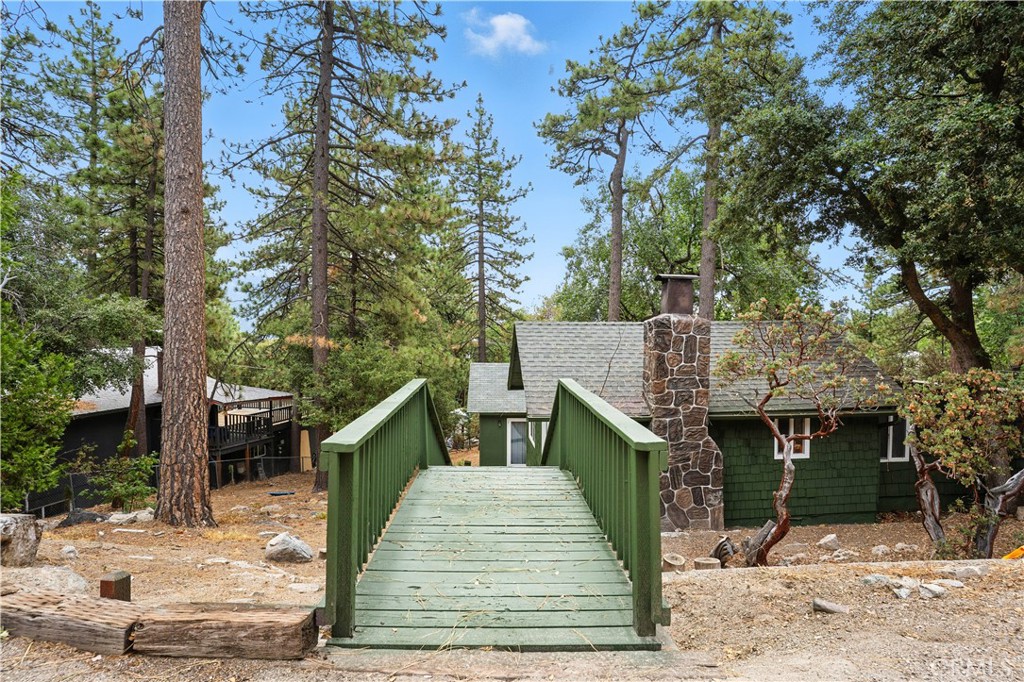 24990 Marion Ridge Drive Idyllwild, CA 92549 - Photo 13 of 41 a view of a house with a yard