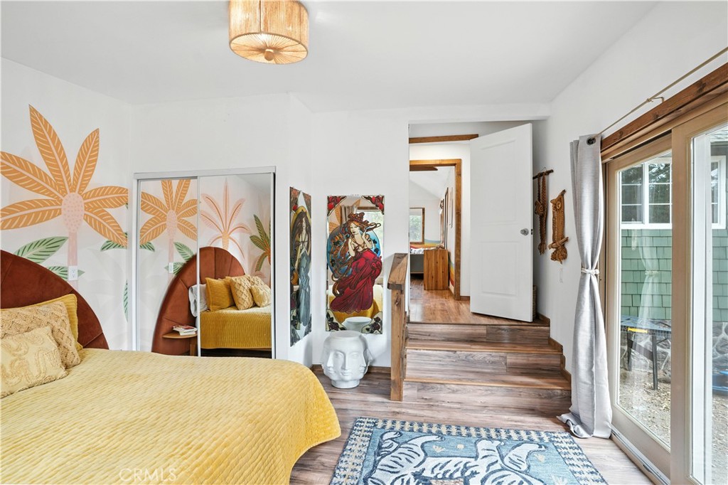 24990 Marion Ridge Drive Idyllwild, CA 92549 - Photo 25 of 41 a bedroom with a bed and a window