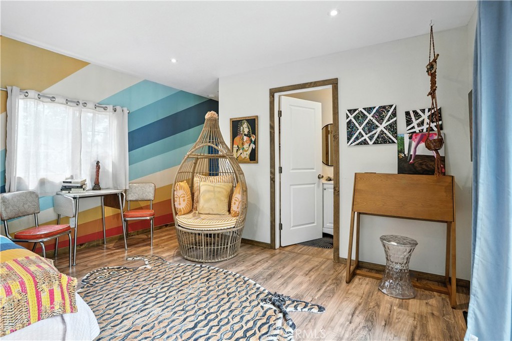 24990 Marion Ridge Drive Idyllwild, CA 92549 - Photo 30 of 41 a living room with furniture and a table