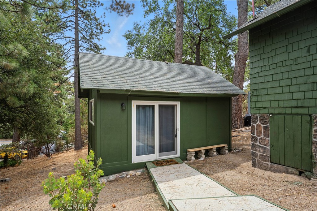 24990 Marion Ridge Drive Idyllwild, CA 92549 - Photo 9 of 41 a view of a house with a patio