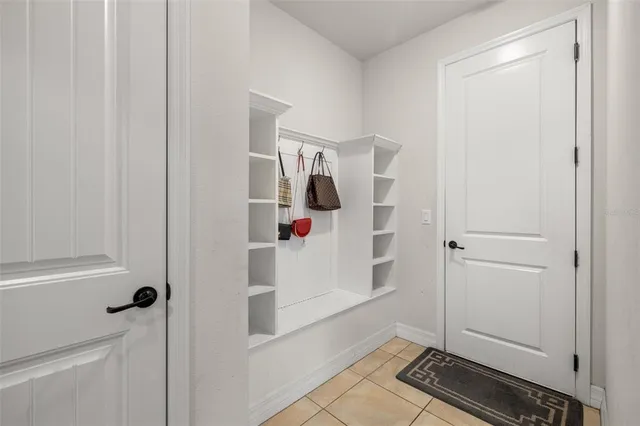 a view of entryway with bathroom