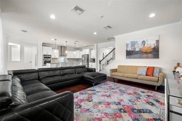 a living room with furniture and a couch