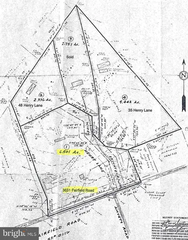 a bathroom with a bathtub and mirror