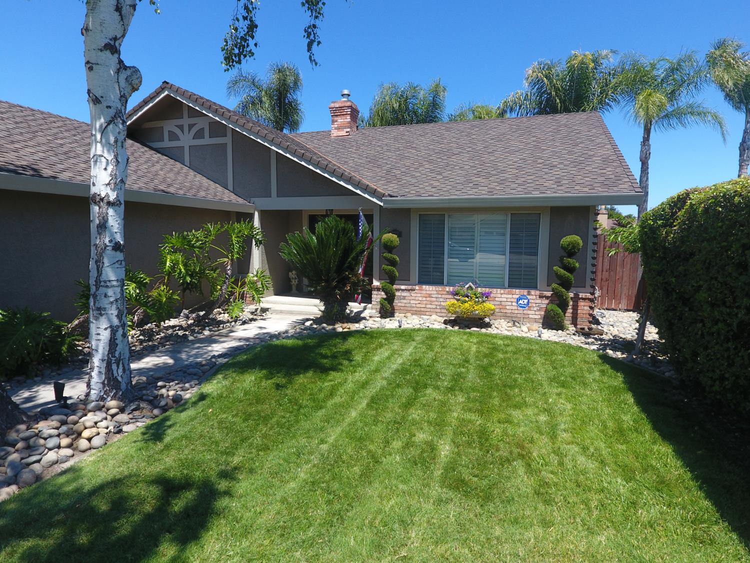 777 Jordanolo Drive Ripon, CA 95366 - Photo 49 of 61 a front view of house with yard and green space