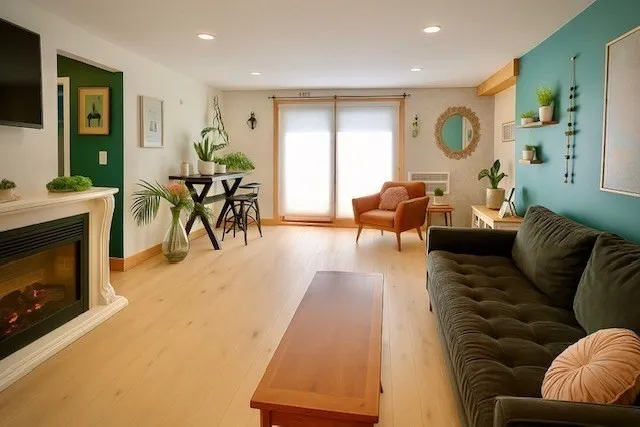 a living room with furniture and a fireplace