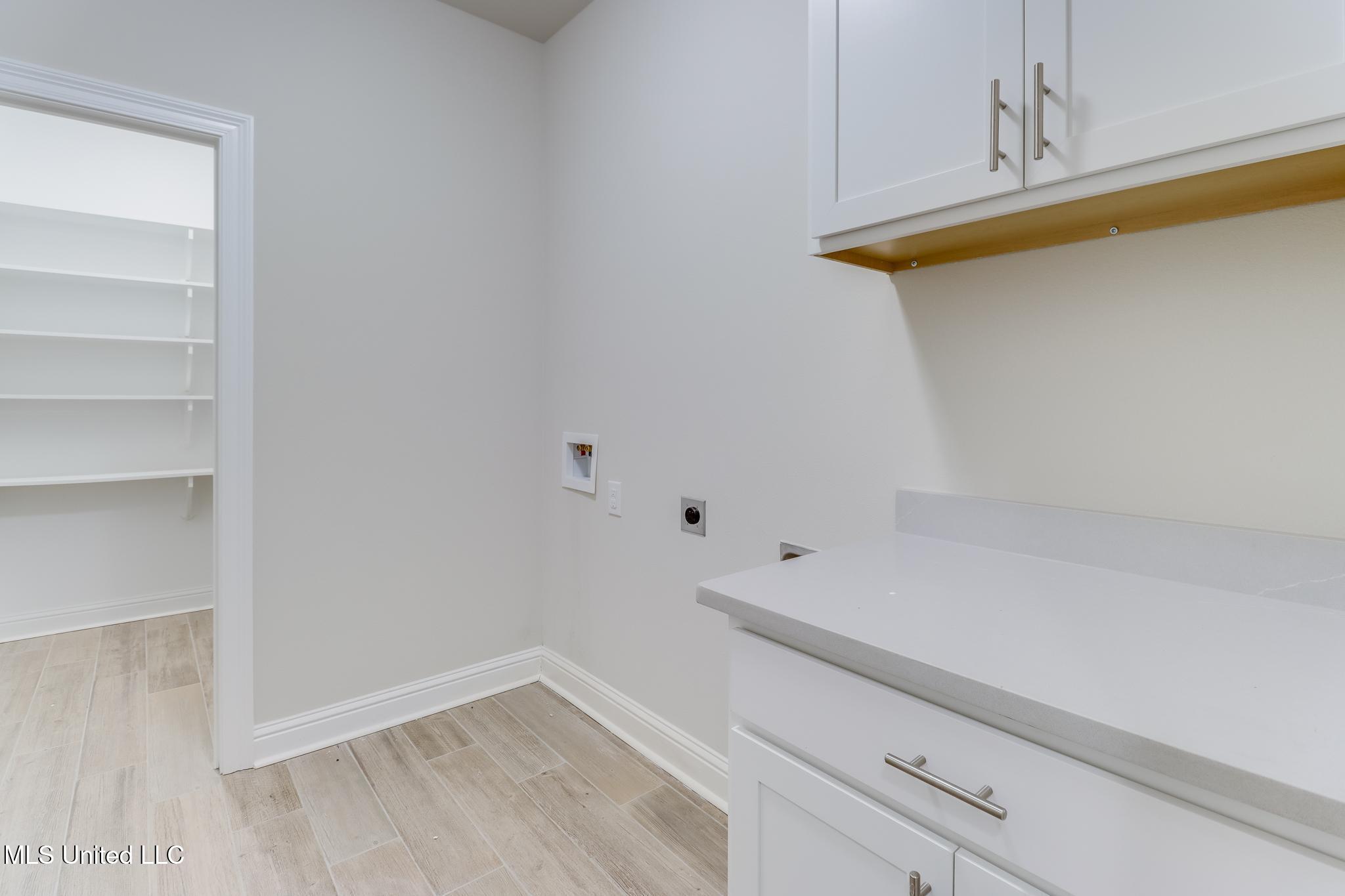 11424 Memphis Circle Ocean Springs, MS 39564 - Photo 24 of 29 Laundry Room