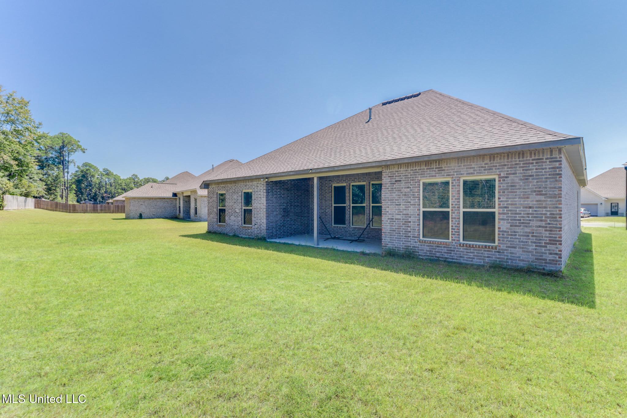 11424 Memphis Circle Ocean Springs, MS 39564 - Photo 26 of 29 Exterior Rear